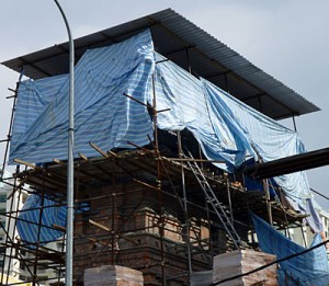 Roofing covered in tarpaulin