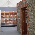 Building DIY - flint wall display at Big Green Home Show 2009