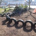 Tires (tyres) used in a school to mark out a lawn and playground