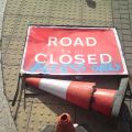 bollard-lying-down-road-closed-sign